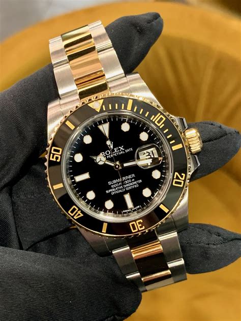 rolex submariner steel and yellow gold black dial|rolex submariner 116613 40mm blue.